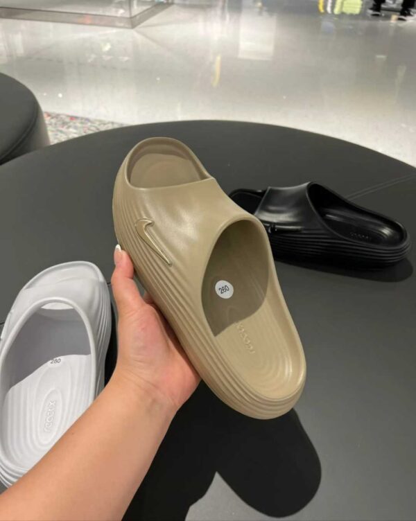 4 Nike ReactX Rejuven8 Men’s Slides